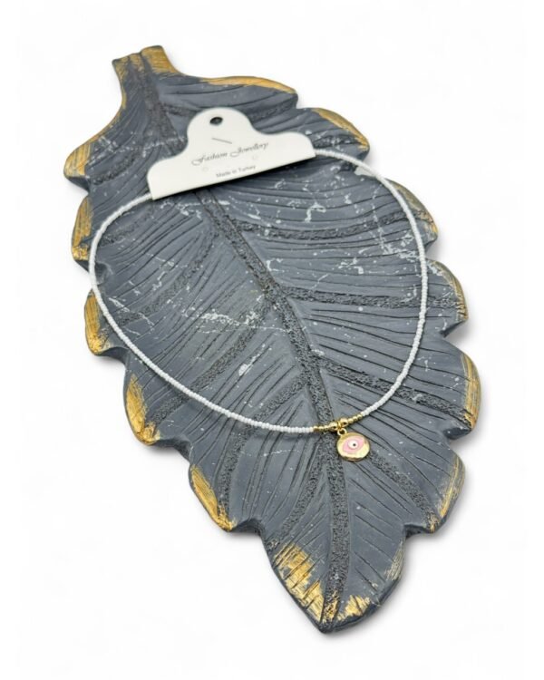 WHITE SAND NECKLACE WITH AN EYE AMULET